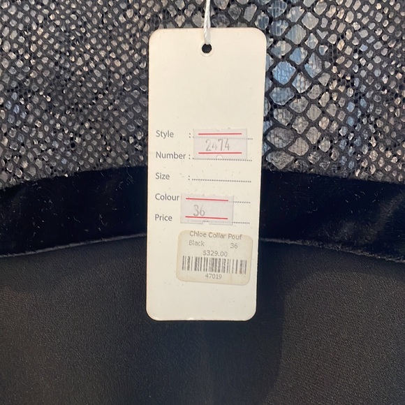 Shanis black long sleeve knee length dress. Poof detail at cuff. - Picture 6 of 6